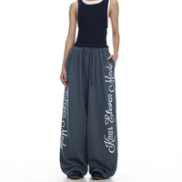 Baggy Retro Print Sweats in slate blue on model front view
