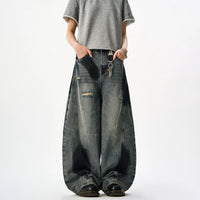 Blemished Blue Jeans front view on model with keychain